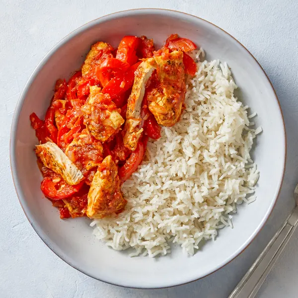 Hähnchen mit Paprika und Reis