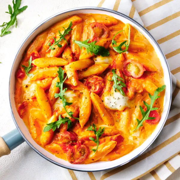 Schupfnudeln in cremiger Tomatensoße