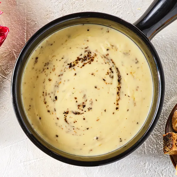 Käsefondue mit Trüffelöl