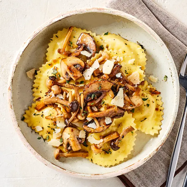 Trüffelravioli mit gebratenen Pilzen