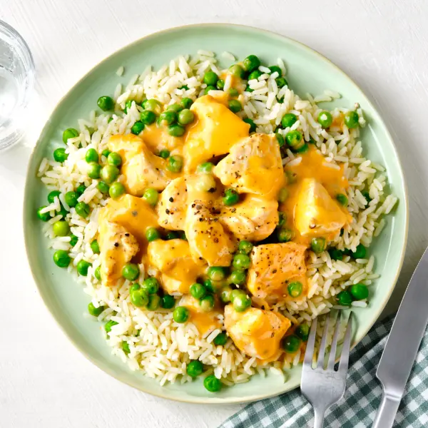 Hähnchen in cremiger Pesto-Sauce mit Erbsen-Reis