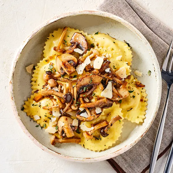 Trüffelravioli mit gebratenen Pilzen
