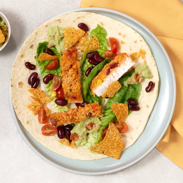Fisch Burrito mit Guacamole und Tortillas