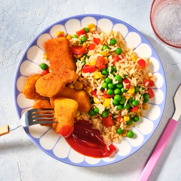 Chicken Nuggets mit Konfetti-Gemüse-Reis